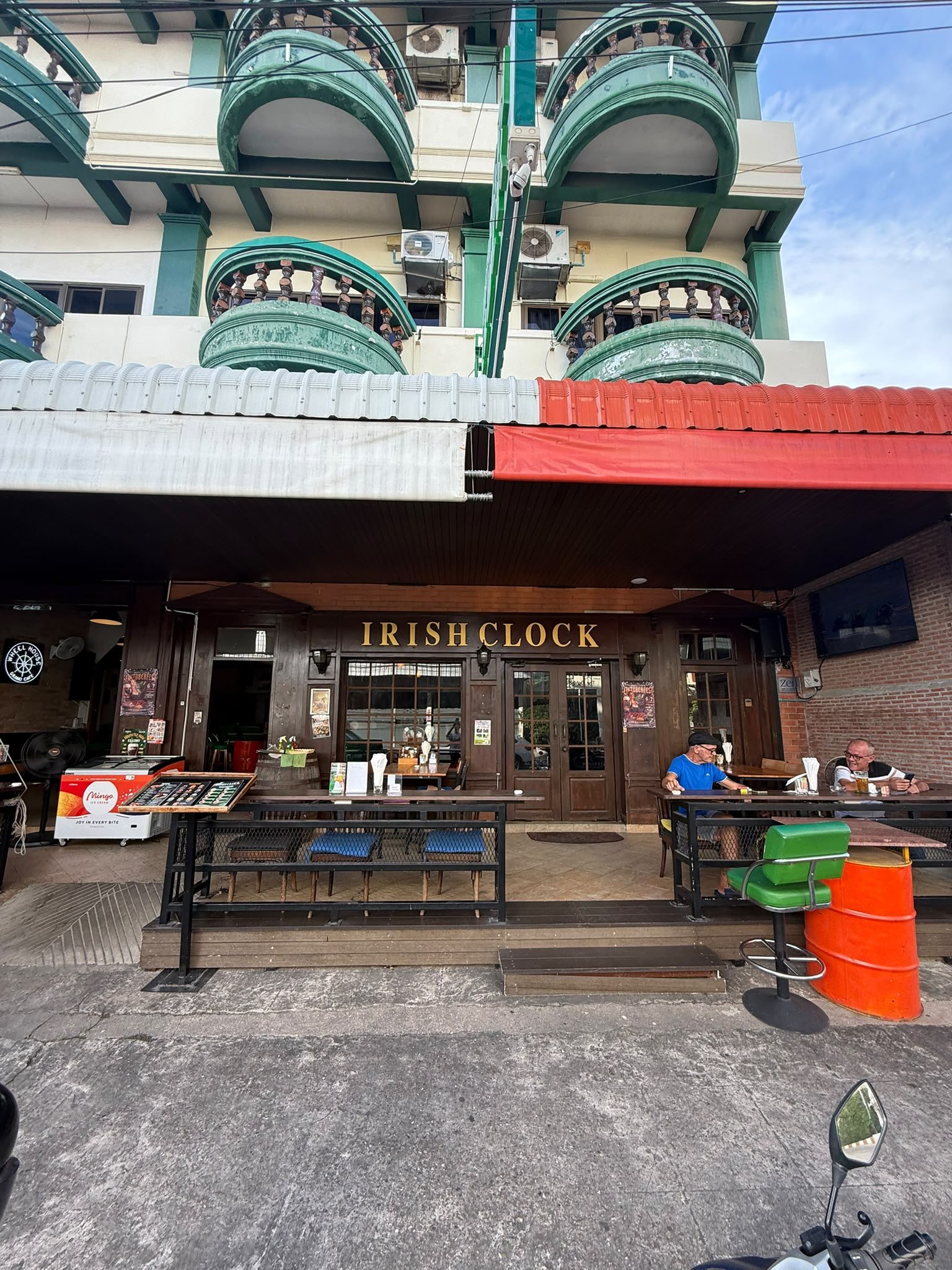 The Irish Clock and terrace seen from the street